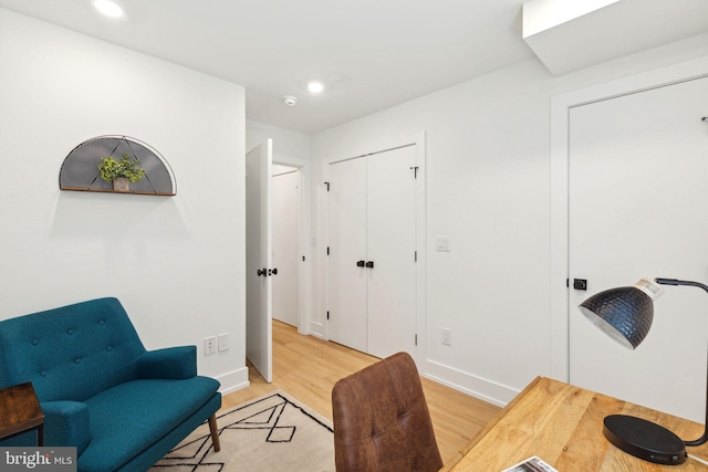 office with recessed lighting, light wood-style flooring, and baseboards