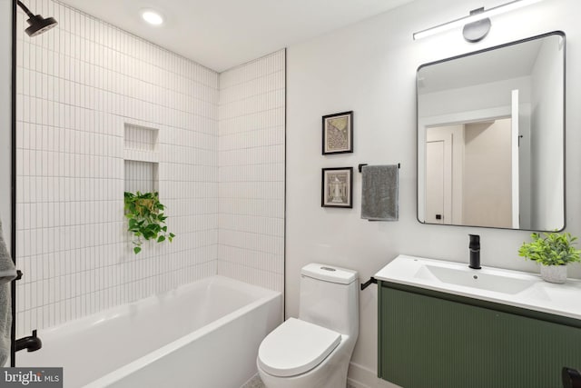 full bath featuring tub / shower combination, vanity, and toilet