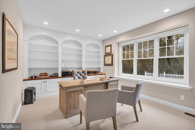 office area with recessed lighting, visible vents, light carpet, and baseboards