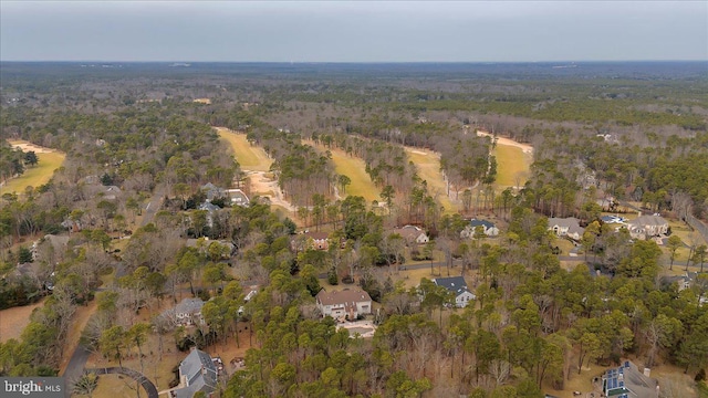 bird's eye view featuring a wooded view