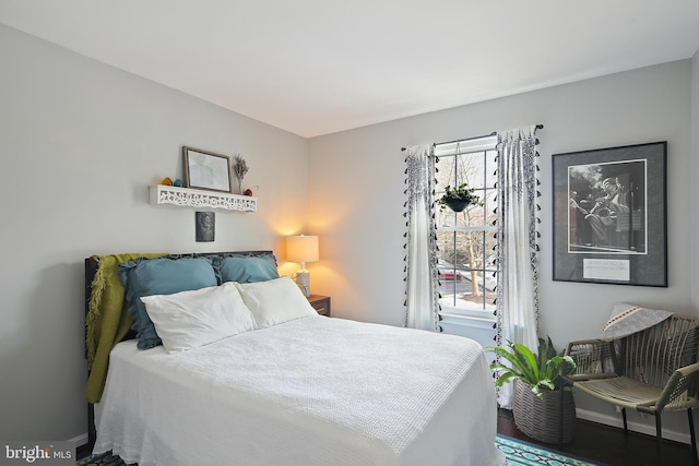 bedroom featuring baseboards