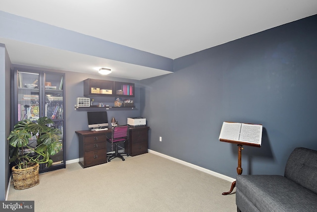 office featuring baseboards and carpet floors