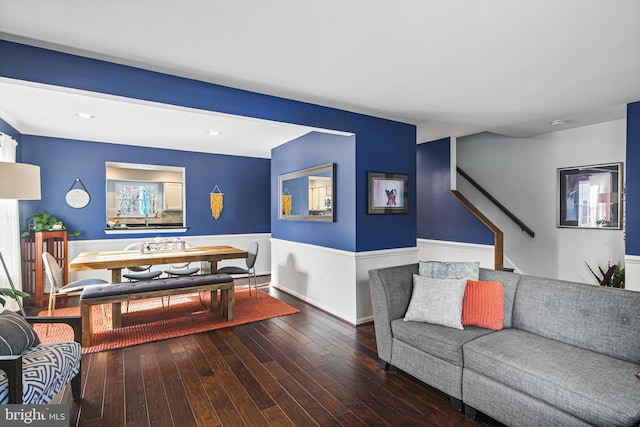 living area featuring recessed lighting and wood-type flooring