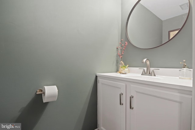 bathroom featuring visible vents and vanity