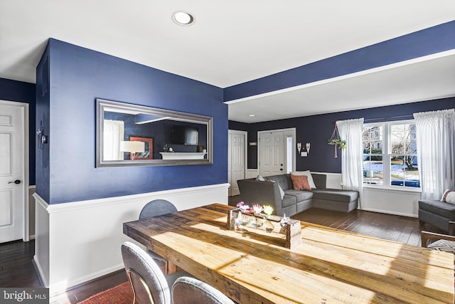 dining room featuring recessed lighting, baseboards, and wood-type flooring