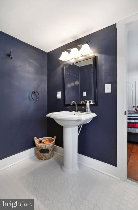 bathroom featuring baseboards