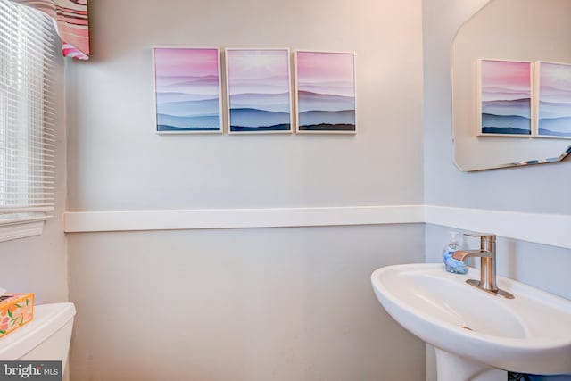 bathroom with a sink and toilet