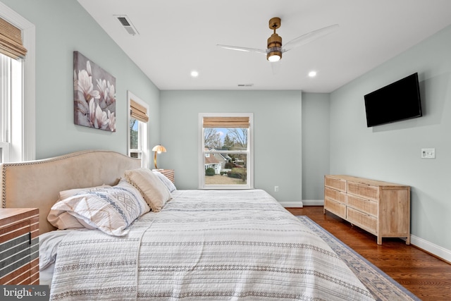 bedroom with dark wood-type flooring, recessed lighting, visible vents, and baseboards