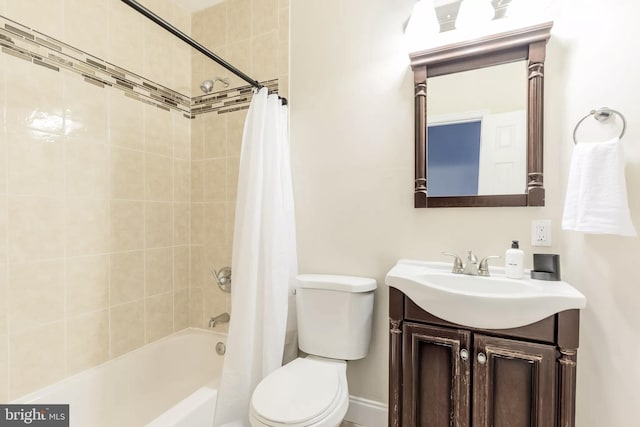 full bathroom with vanity, shower / bath combo with shower curtain, and toilet