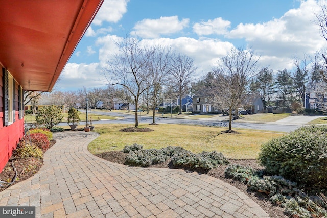 view of yard featuring a residential view