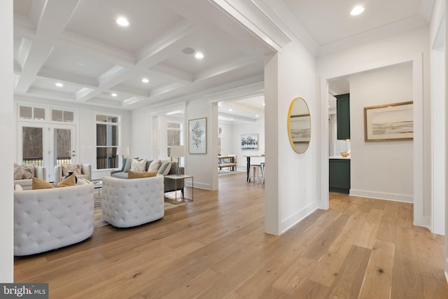 living room featuring beamed ceiling, light wood-type flooring, coffered ceiling, and recessed lighting