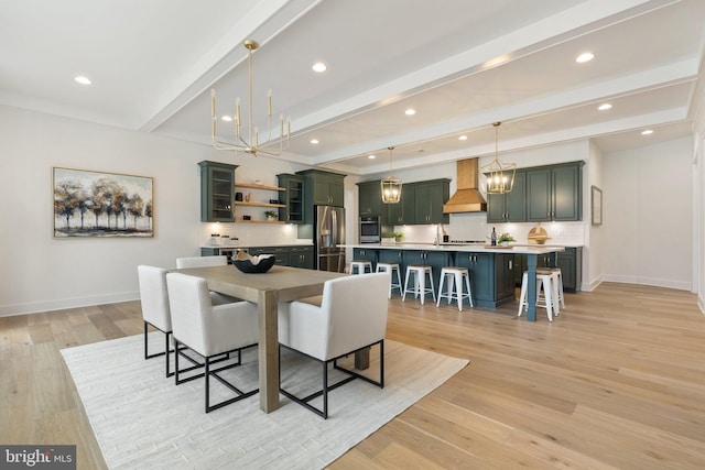 dining area with light wood-type flooring, beamed ceiling, baseboards, and recessed lighting