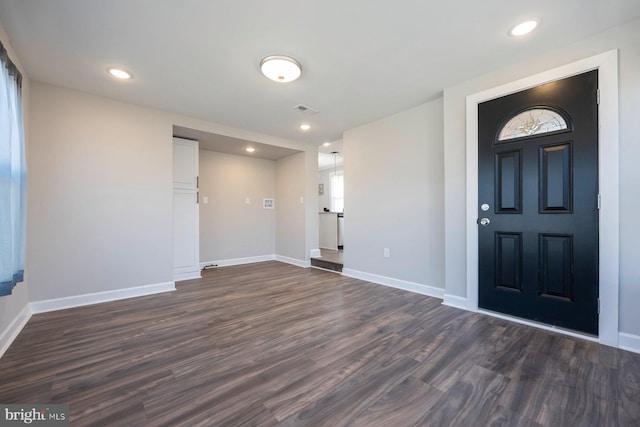 entrance foyer with recessed lighting, visible vents, baseboards, and dark wood-type flooring