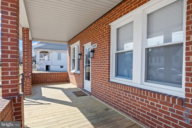 wooden deck featuring a porch