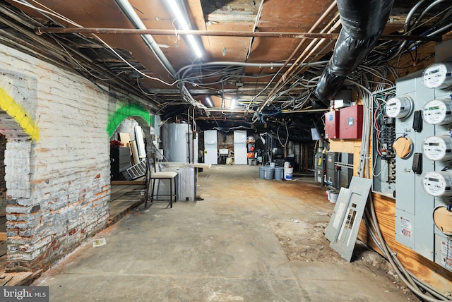 unfinished basement with water heater