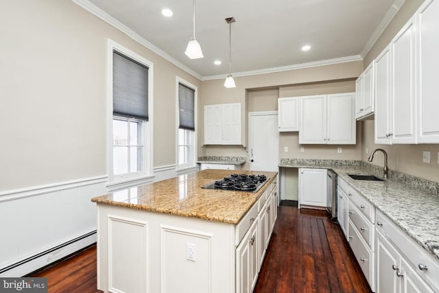 kitchen featuring white cabinets, dark wood-style floors, black gas cooktop, a baseboard heating unit, and a sink