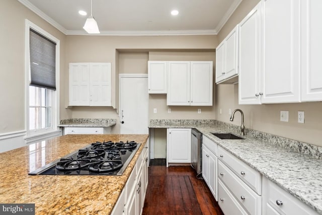 kitchen with black gas cooktop, dark wood-style flooring, a sink, white cabinets, and crown molding