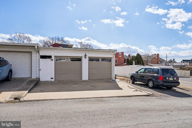 garage featuring fence