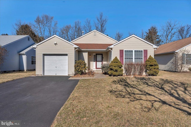 single story home featuring a garage, a front lawn, and aphalt driveway