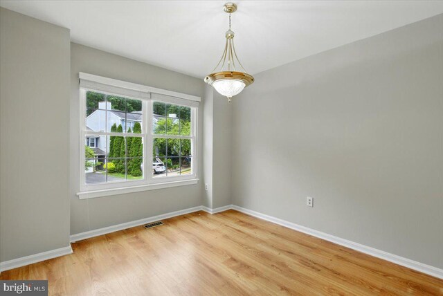 10204 Faire Commons Ct, Burke, VA 22015 - empty room with light wood-style flooring and baseboards