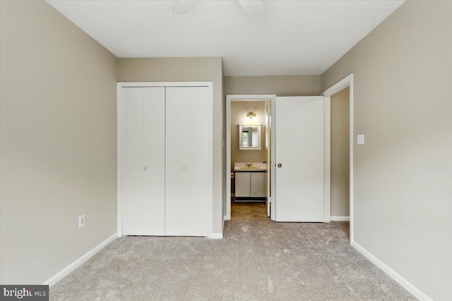 10204 Faire Commons Ct, Burke, VA 22015 - unfurnished bedroom with carpet flooring, baseboards, and a closet