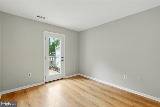 10204 Faire Commons Ct, Burke, VA 22015 - spare room featuring light wood-style flooring and baseboards