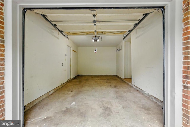 10204 Faire Commons Ct, Burke, VA 22015 - garage featuring a garage door opener