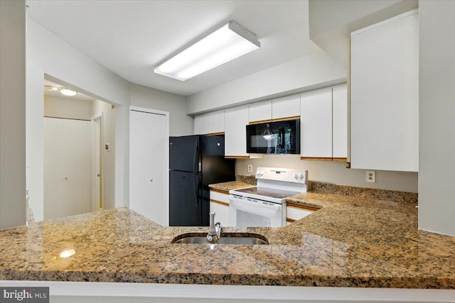 10204 Faire Commons Ct, Burke, VA 22015 - kitchen with black appliances, a sink, light stone countertops, white cabinets, and a peninsula