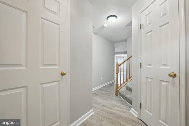1332 Cranes Bill Way, Woodbridge, VA 22191 - hall with baseboards, light wood-type flooring, and stairway