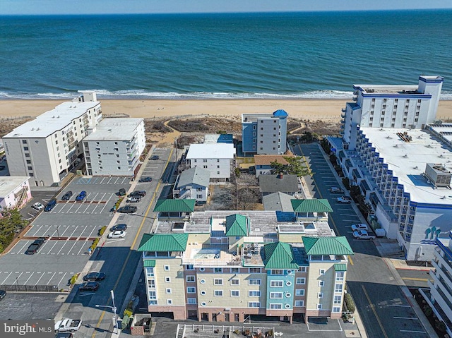 bird's eye view with a view of the beach and a water view