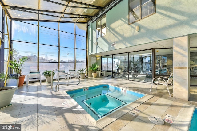 view of pool with an indoor hot tub and a swimming pool