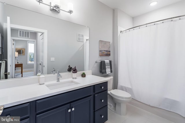 bathroom featuring shower / bathtub combination with curtain, vanity, visible vents, and tile patterned floors