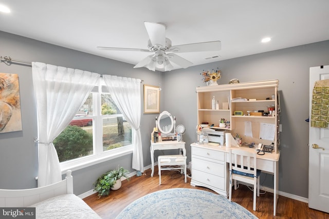 interior space with ceiling fan, recessed lighting, wood finished floors, visible vents, and baseboards