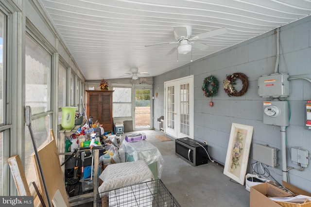 sunroom with french doors and ceiling fan