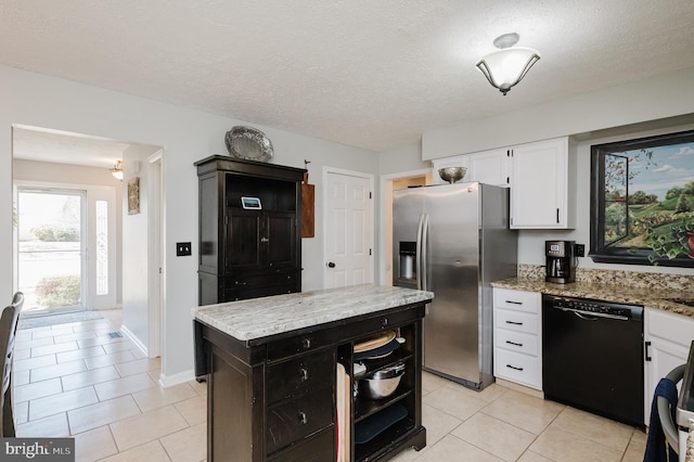 kitchen with black dishwasher, light stone countertops, white cabinetry, and stainless steel fridge with ice dispenser