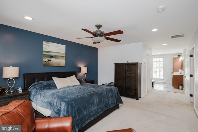 bedroom featuring baseboards, visible vents, connected bathroom, carpet floors, and recessed lighting