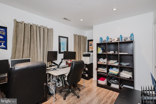 office with wood finished floors, visible vents, and recessed lighting