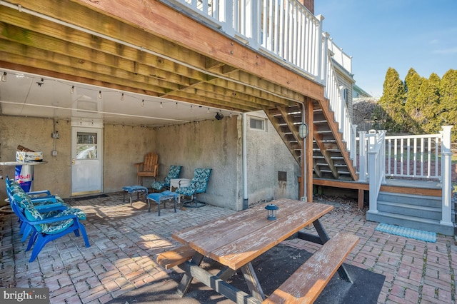 view of patio / terrace with stairway