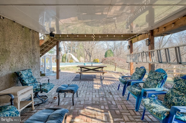 view of patio / terrace with an outdoor hangout area and outdoor dining space