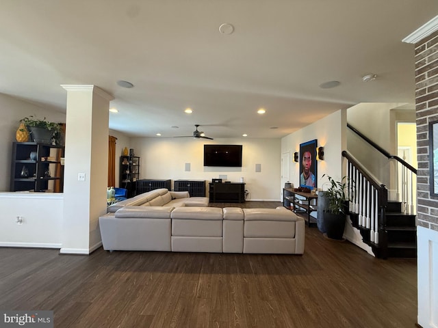 living room featuring baseboards, a ceiling fan, stairway, dark wood-style flooring, and recessed lighting