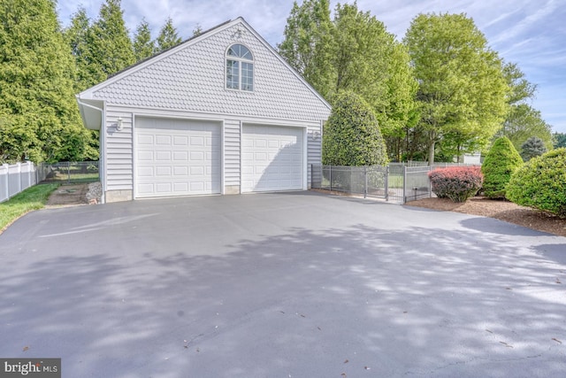 garage with fence