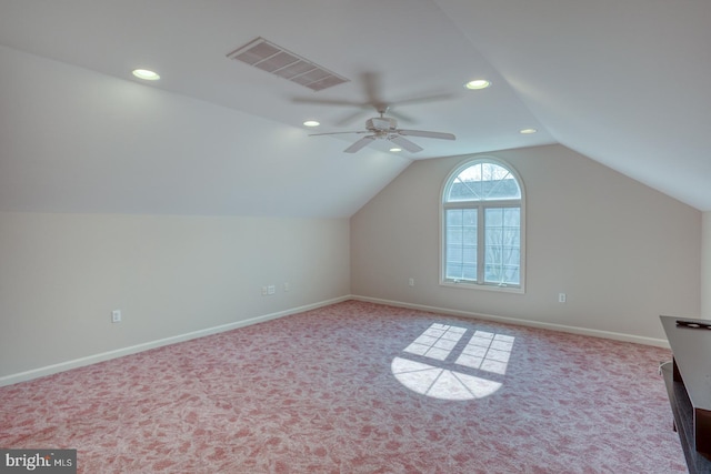 bonus room with lofted ceiling, recessed lighting, visible vents, carpet flooring, and baseboards