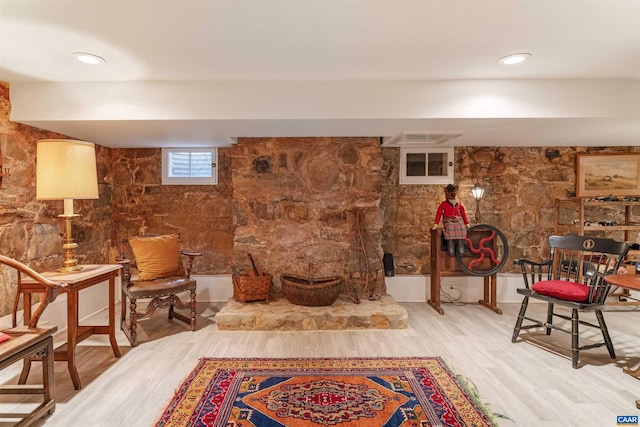 sitting room featuring wood finished floors