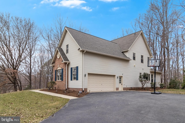 view of property exterior with aphalt driveway, roof with shingles, a lawn, crawl space, and a garage