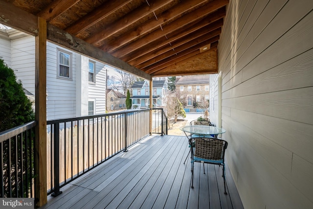 wooden terrace featuring a residential view