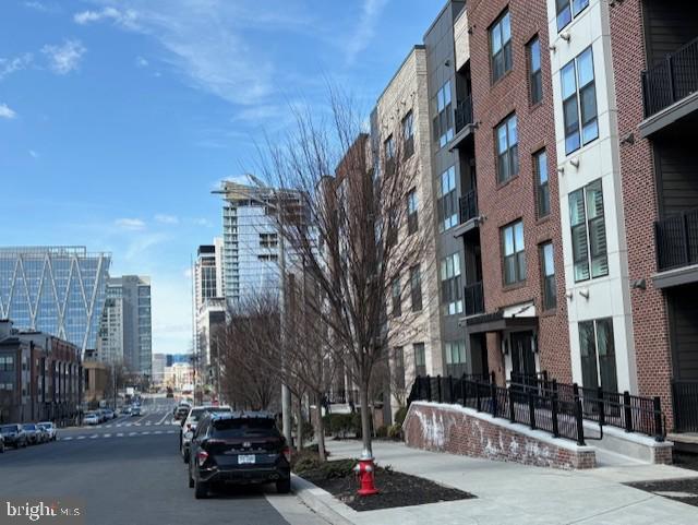 view of building exterior featuring a view of city