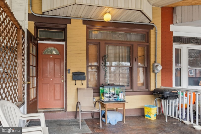 entrance to property with a porch