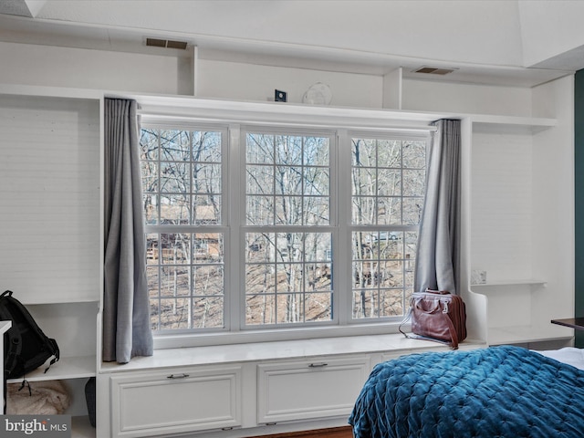 bedroom featuring visible vents