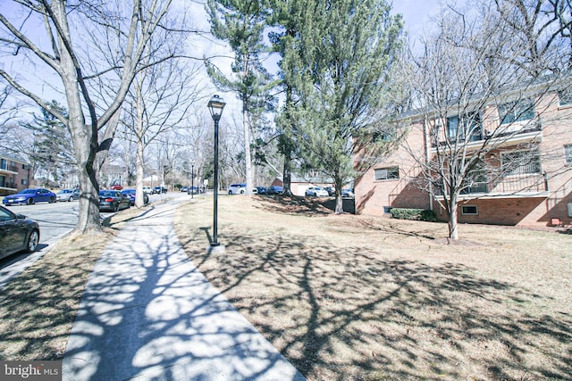 view of street with sidewalks and street lighting