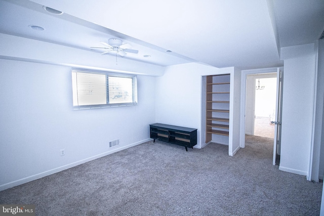 unfurnished bedroom with visible vents, baseboards, ceiling fan, and carpet flooring